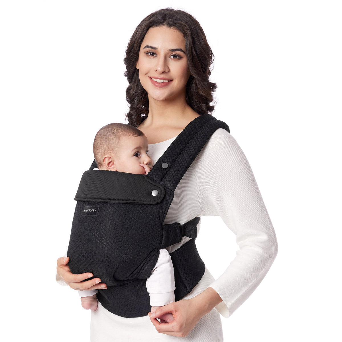 Momcozy PureHug baby carrier in black. Mother babywearing with comfortable, supportive design.